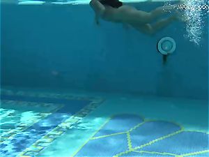 Jessica Lincoln diminutive tatted Russian nubile in the pool